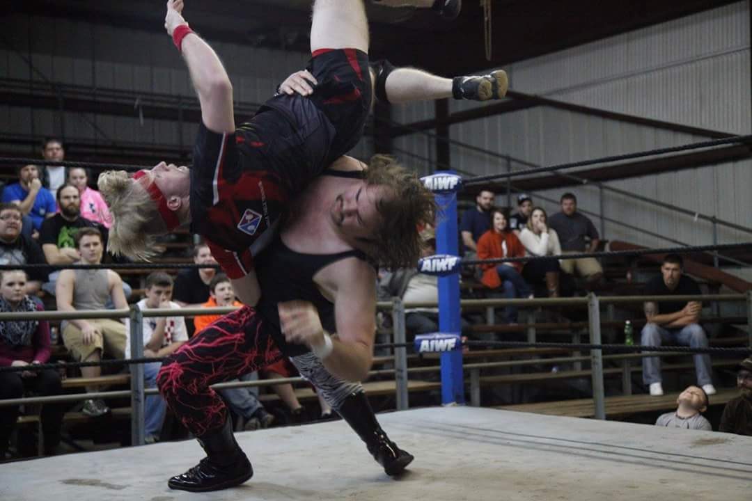 Jimmy Jack Funk Jr. delivers a gutwrench suplex to Waylon Maze in front of a live crowd